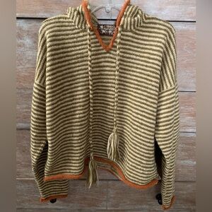 Tara Handknits pull over sweater with hood.